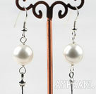 Dangle style white round seashell earrings with long tail