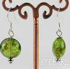 lovely round shape green colored glaze earrings