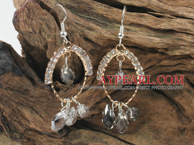 lovely smoky color crystal earrings on gold tone loop with rhinestone
