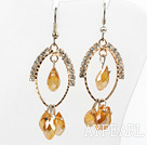 lovely yellow crystal earrings on gold tone loop with rhinestone