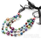 3 strand multi color shell beaded neckalce with black ribbon