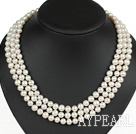 graceful three strand white pearl necklace with gold color clasp