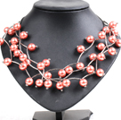Trendy Style Multi Strand Orangepink Seashell Beads Twisted Necklace With Bending Alloyed Tube