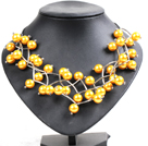 Trendy Style Multi Strand Bright Yellow Seashell Beads Twisted Necklace With Bending Alloyed Tube