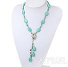 Wholesale Elegant Round And Oval Shape Turquoise Metal Charm Pendant Necklace With Flower Clasp
