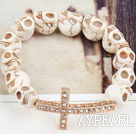 Golden Color Rhinestone Sideway/Side Way Cross and Howlite Skull Stretch Halloween Bracelet