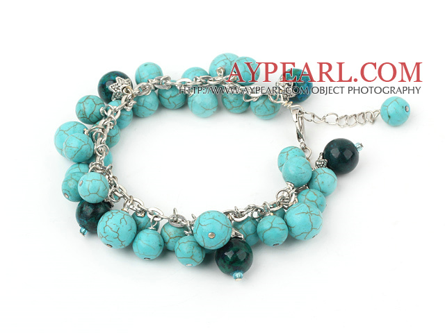 phoenix stone and burst pattern turquoise bracelet with metal chain and lobster clasp