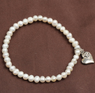 Simple Elegant Style 4-5Mm Natural White Freshwater Pearl Elastic/ Stretch Bracelet With Heart Charm