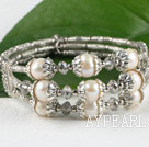 Multi strand white freshwater pearl metal bangle bracelet