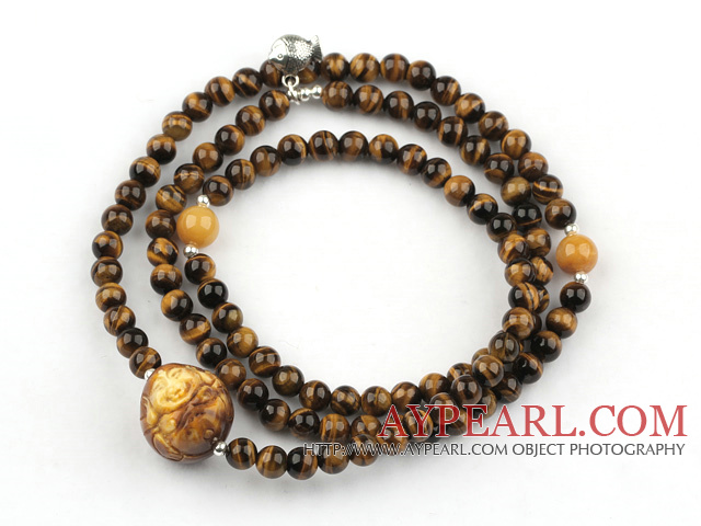 Tiger Eye Beaded Stretch Bracelet with Wax Buddha's Head and Yellow Jade and Sterling Silver Fish Accessory ( Can also be Necklace )