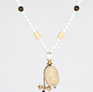 Wholesale White Porcelain Stone and Black Agate Necklace with Corozo Nut Laugh Baddha Pendant