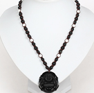 Wholesale Obsidian Beads and White Porcelain Stone Necklace with Laugh Baddha Pendant