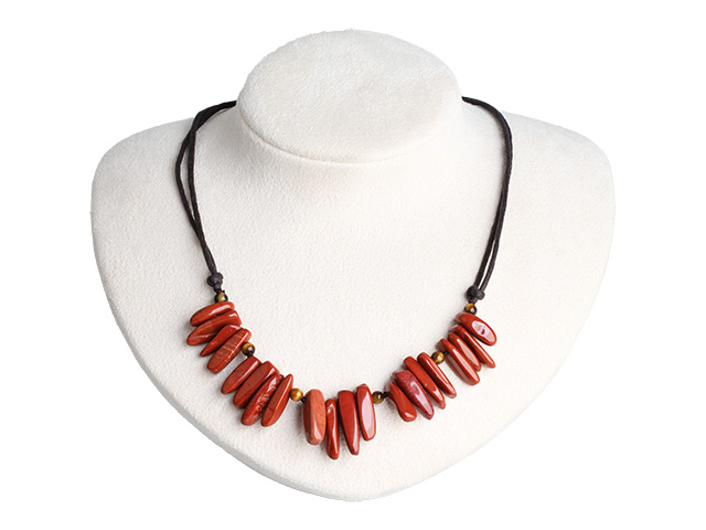A long red jade necklace with side holes