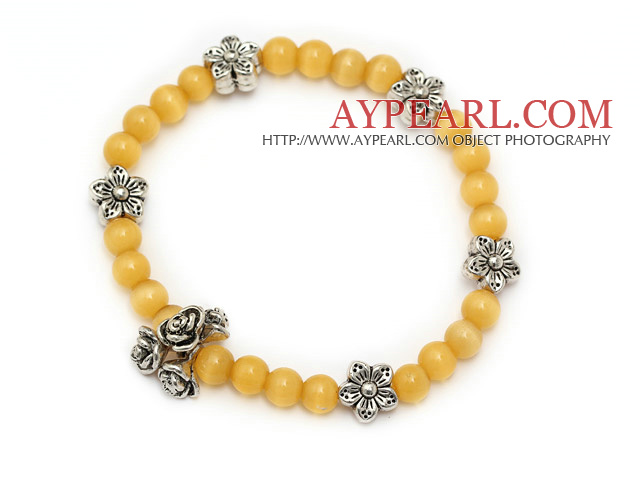beautiful yellow round cats eye and tibet silver flower charm beaded bracelet