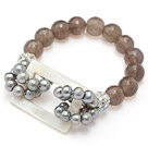 Discount fashion gray freshwater pearl white hollow shell and facted gray agate bracelet with colorful rhinestone ball